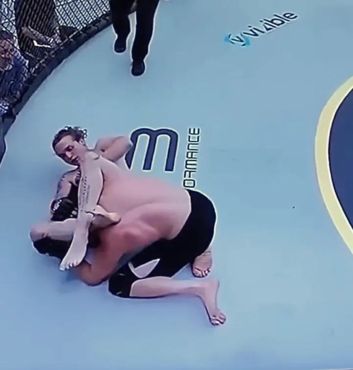 Overhead broadcast view of Nathan Johnson on the mat at his debut, LFS Middletown Mayhem