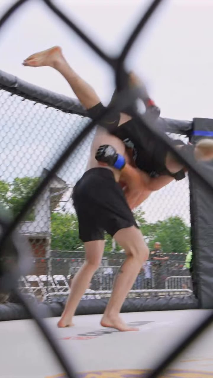 Nathan Johnson lifts his opponent overhead and slams him to the mat at his debut.